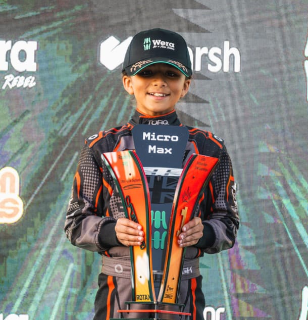 British MicroMax Champion 2025 celebrating kart racing championship win